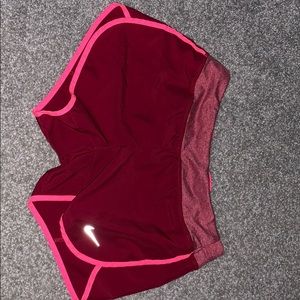 red nike shorts